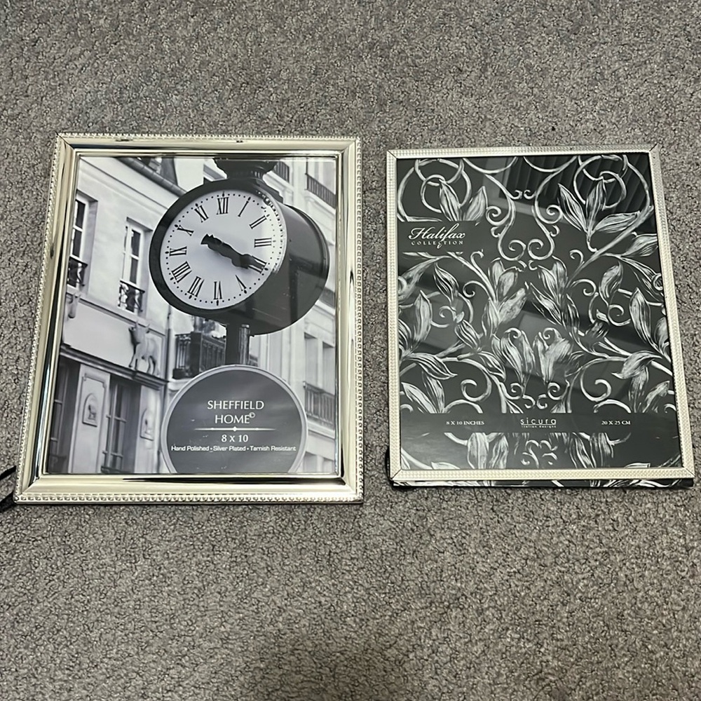 Two Silver Plated 8 by 10 frames
